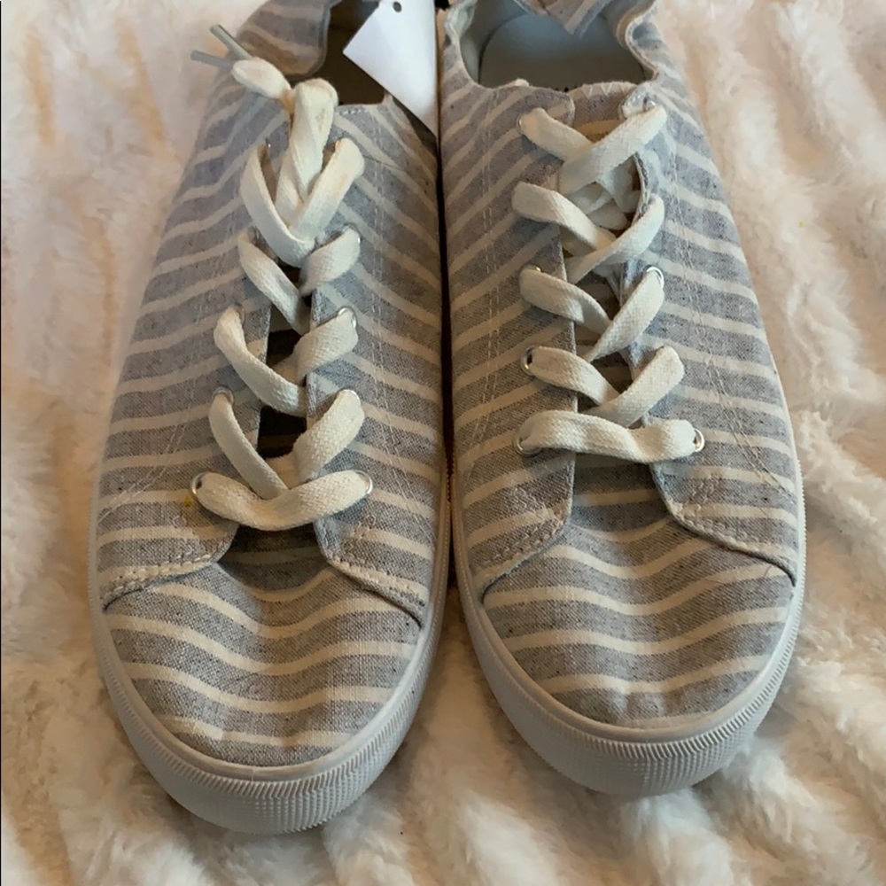 Gray and white striped sneakers